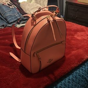 COACH color-block signature Jordyn backpack pink.